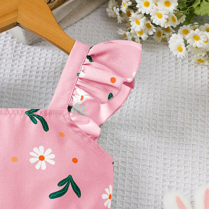 Detail view showing the fabric finish and pattern of the girls botanical print flutter sleeve dress