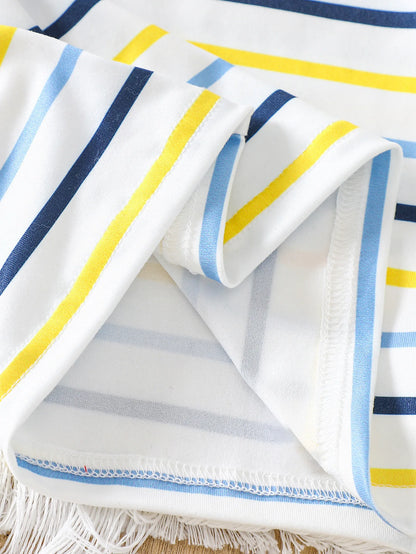 Side or lifestyle view of baby boys striped t-shirt and bear denim overalls set