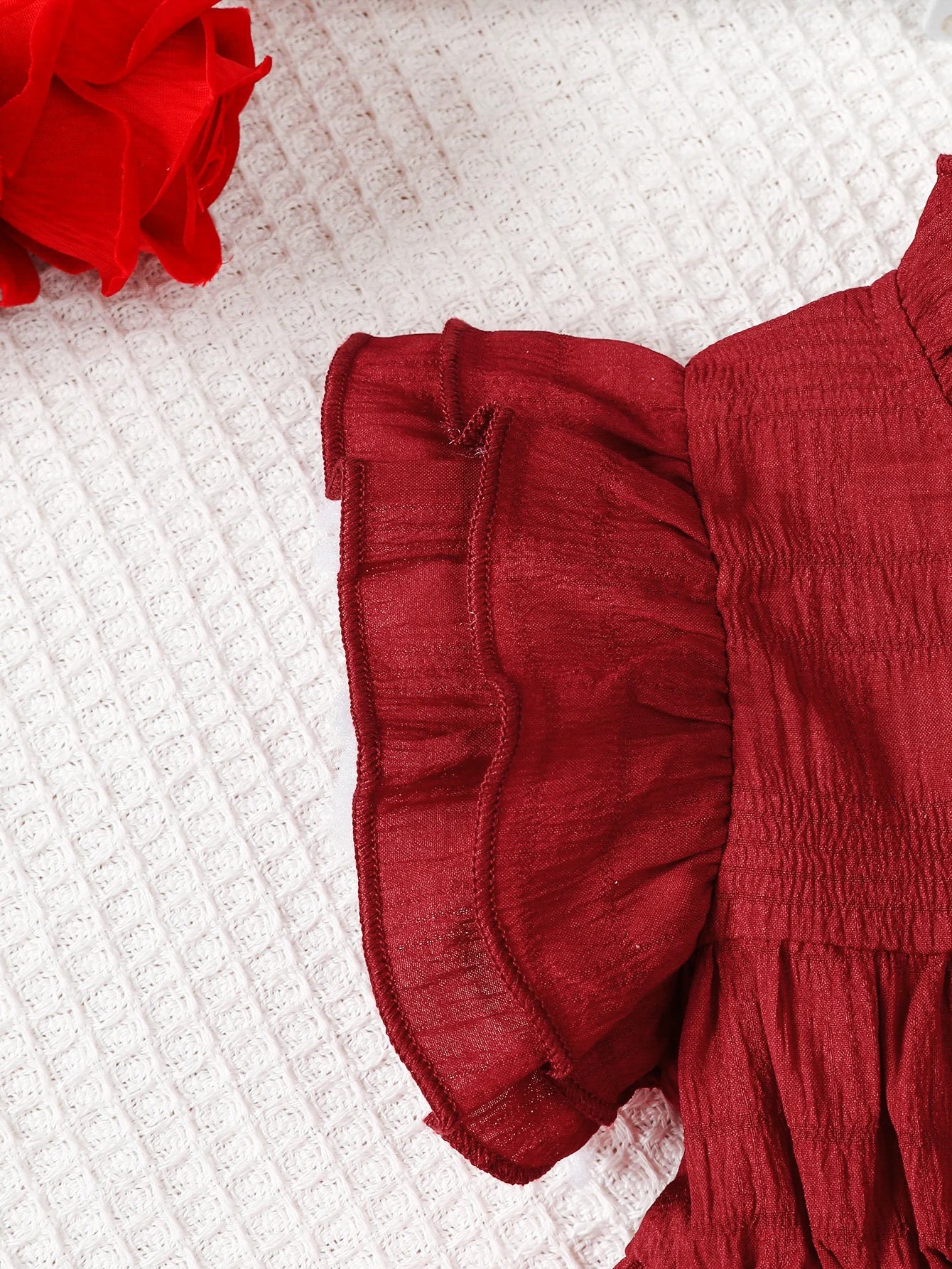 Design features and details on the baby girls ruffle top, shorts and bag set - view 4