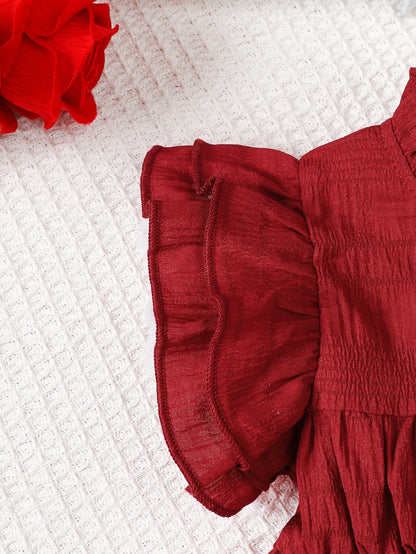 Design features and details on the baby girls ruffle top, shorts and bag set - view 4