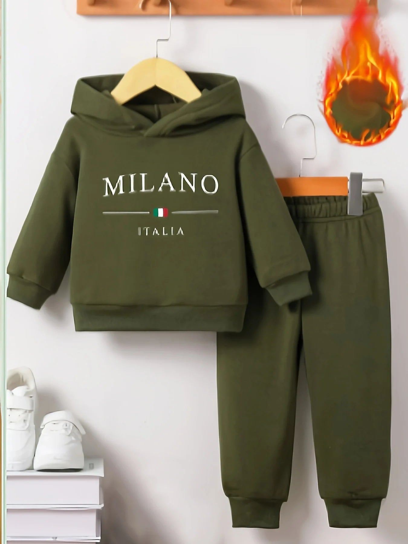 Baby boy wearing a fleece hooded tracksuit with letter print