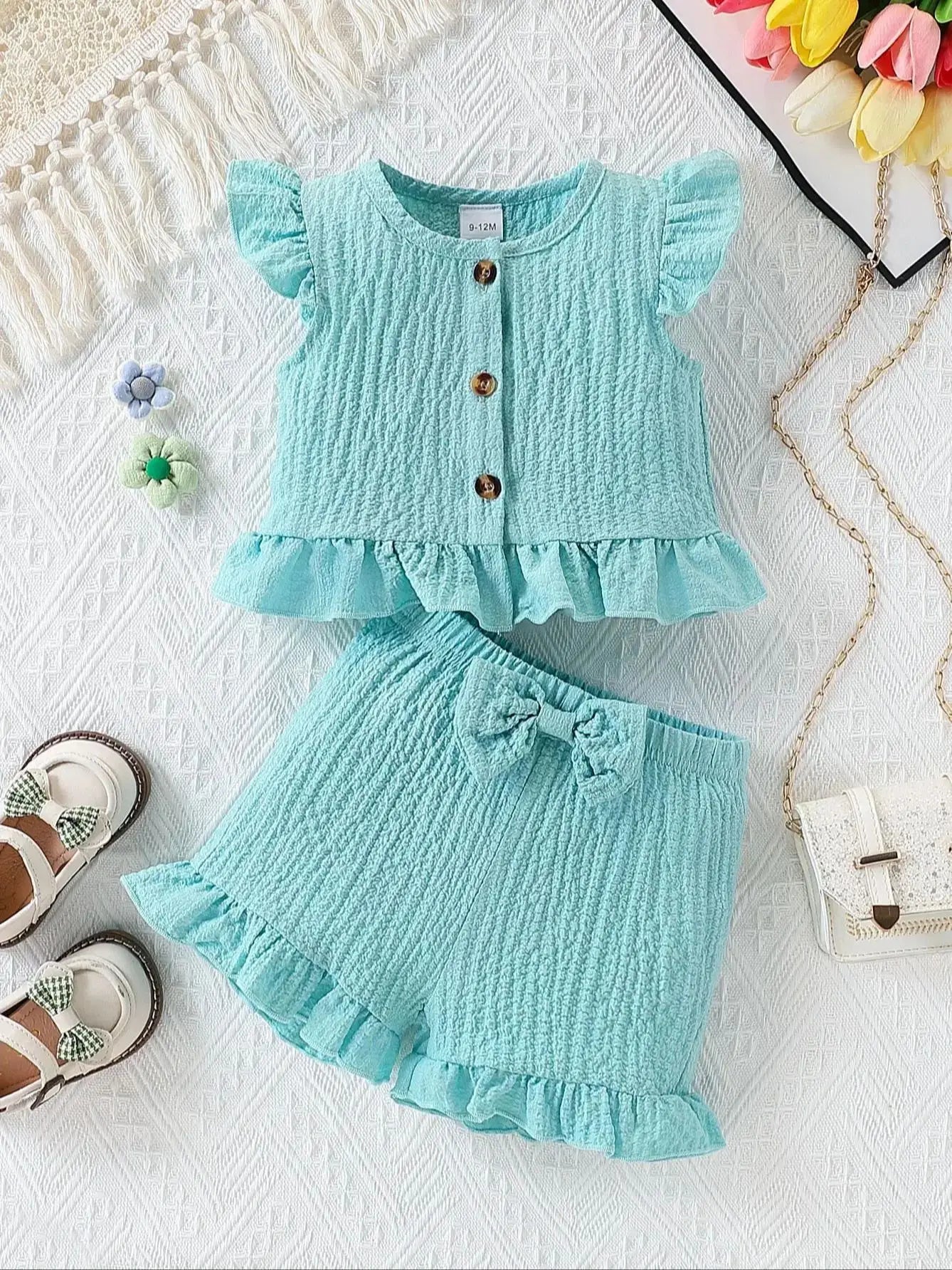 Back view of baby girls fly sleeve top & shorts set