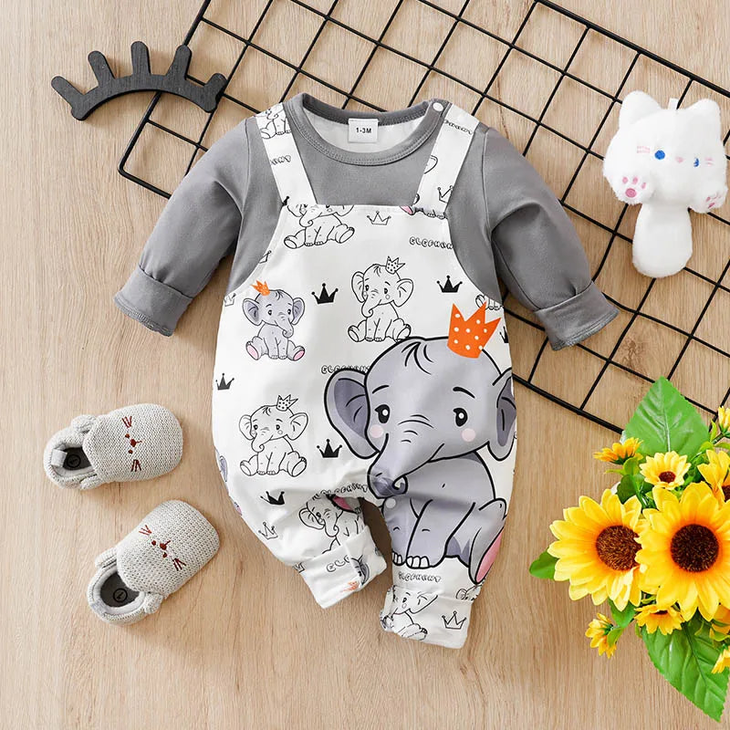Baby boy wearing a long-sleeve romper with an elephant print and faux braces