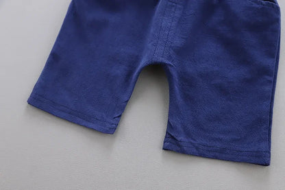 Detail view showing the fabric finish and pattern of the baby boys casual summer top and shorts set