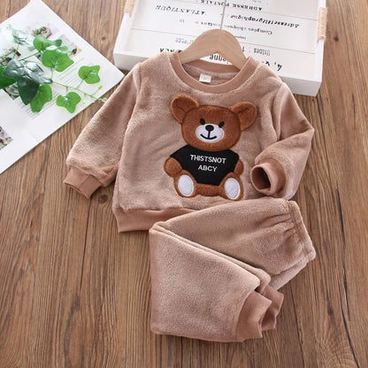 Detail view showing the fabric finish and pattern of the kids flannel fleece cartoon bear pyjama set
