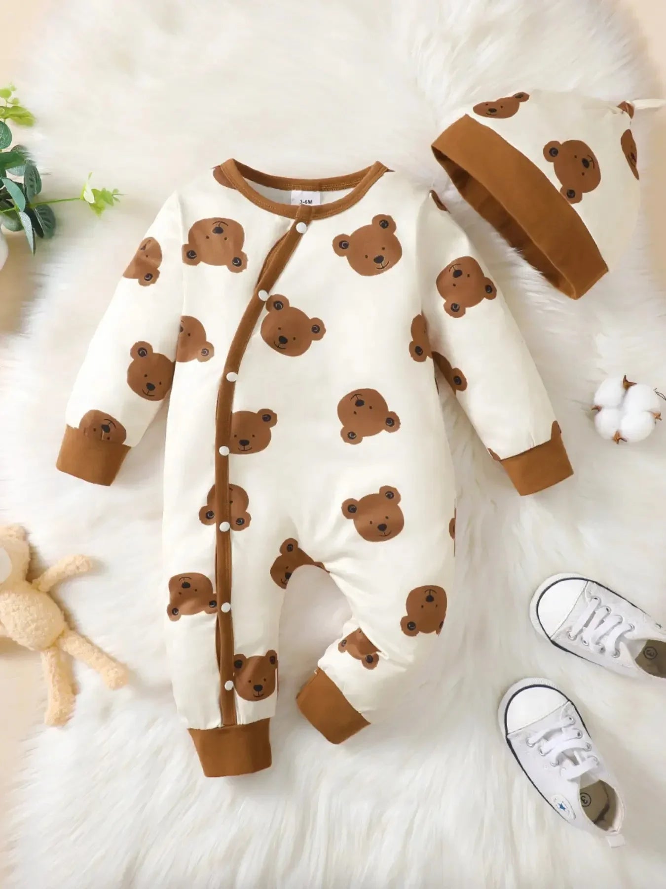 Baby boys long-sleeve winter romper featuring an all-over bear print