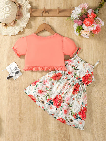 Girl wearing a puff sleeve top and a floral skirt with suspender straps