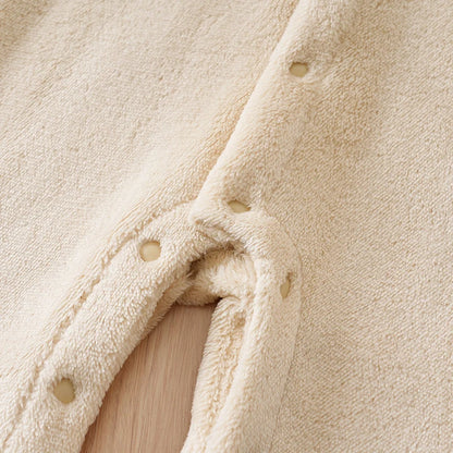 Fabric and texture detail of baby bear hooded winter flannel romper