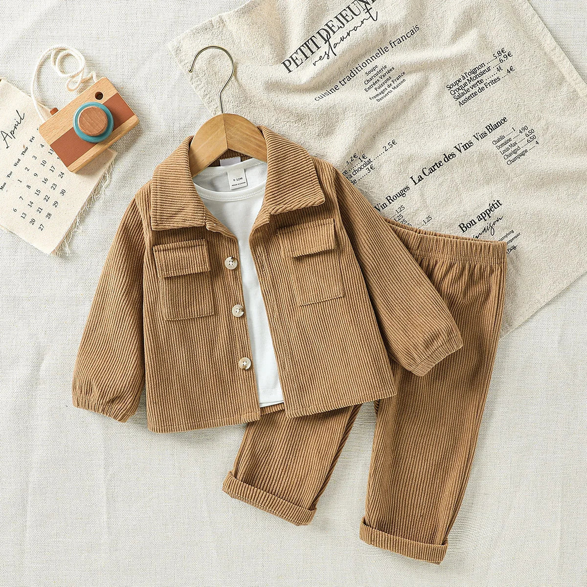 Side view of baby boys stylish jacket & pants outfit