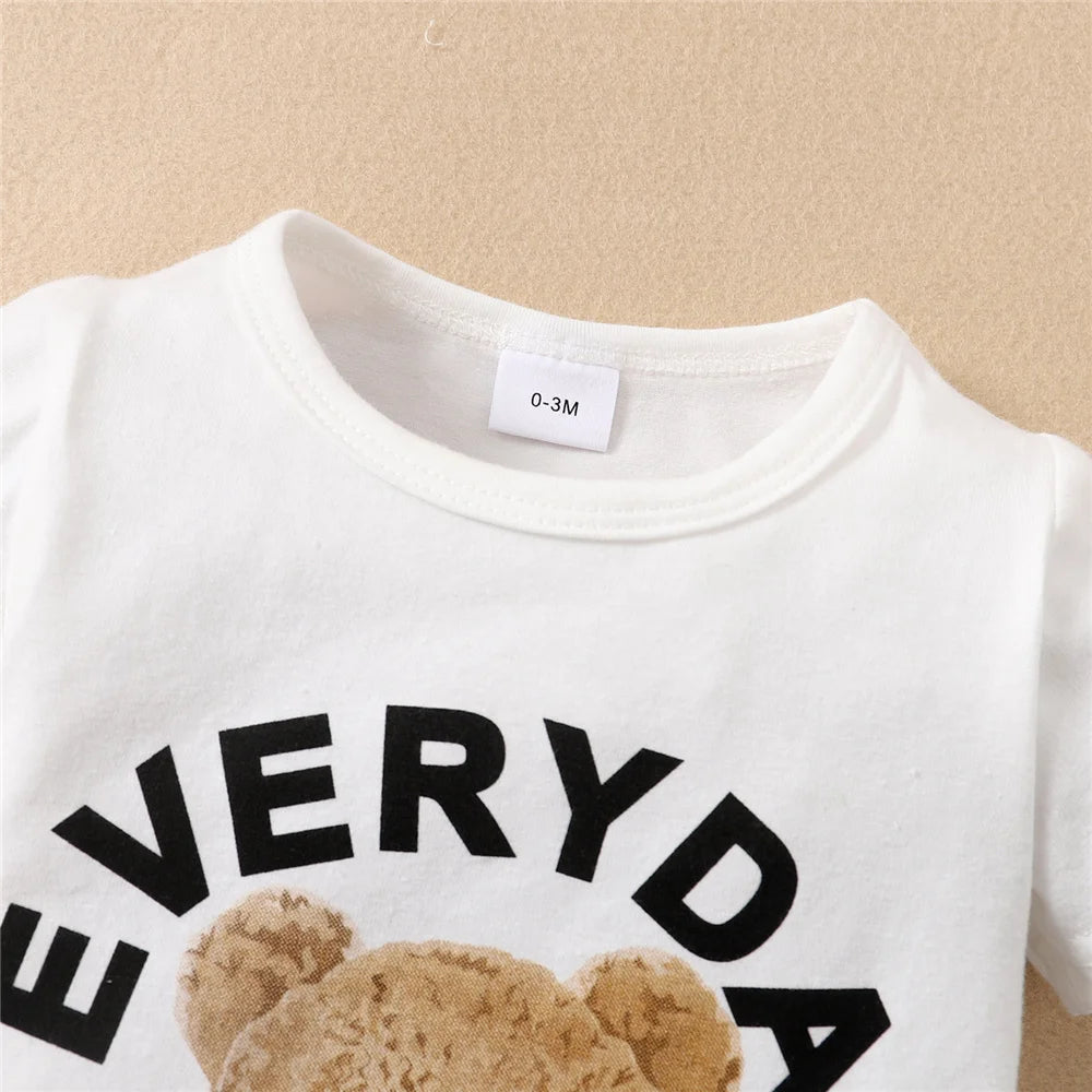 Occasion style layout showcasing the baby boys panda bear short sleeve romper and hat set