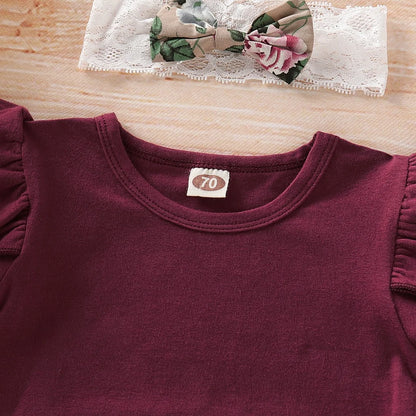 Styling option and alternate perspective of the baby girls christmas floral romper and suspender skirt set
