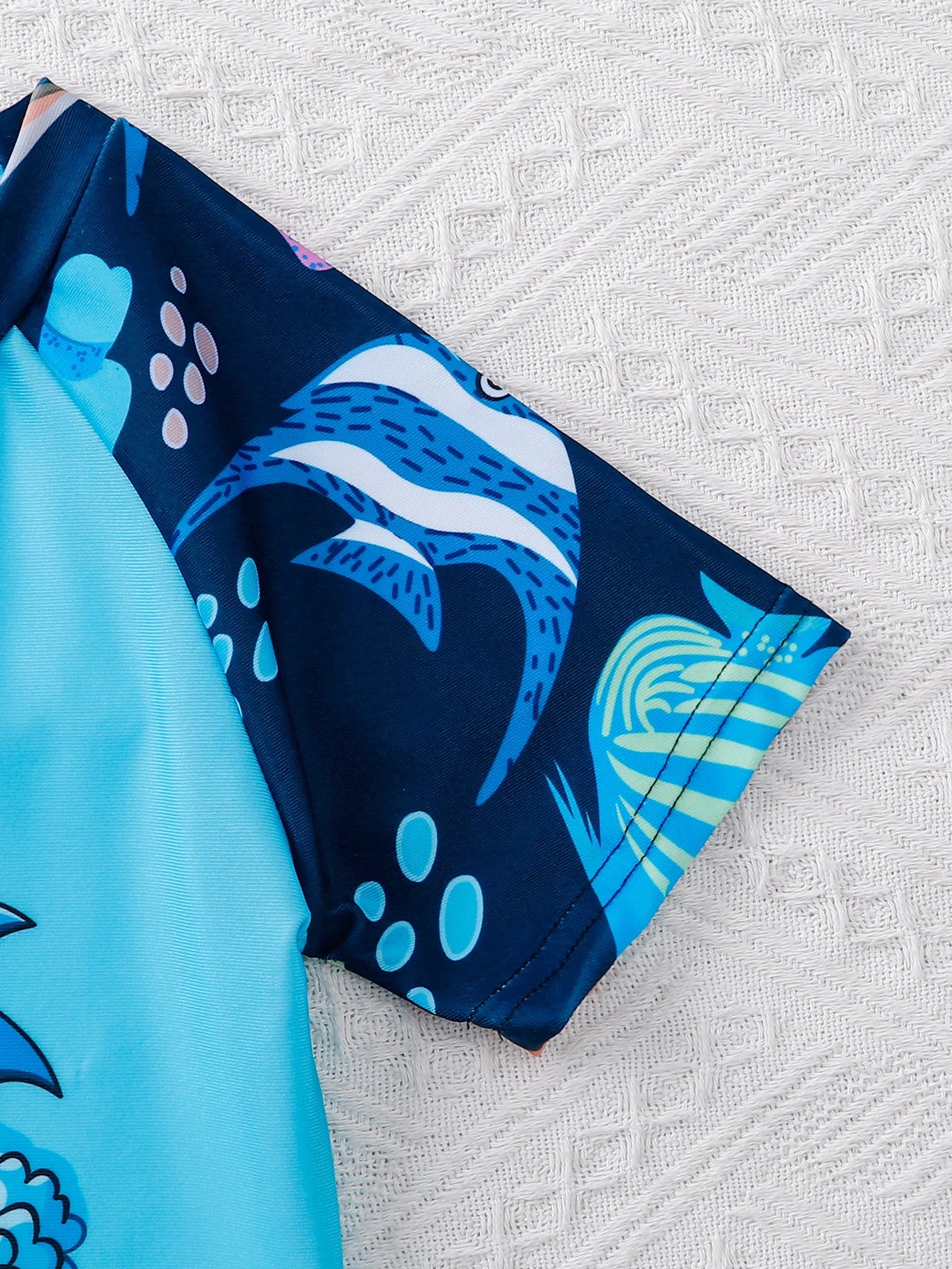 Quick-dry fabric texture on boys holiday swimwear