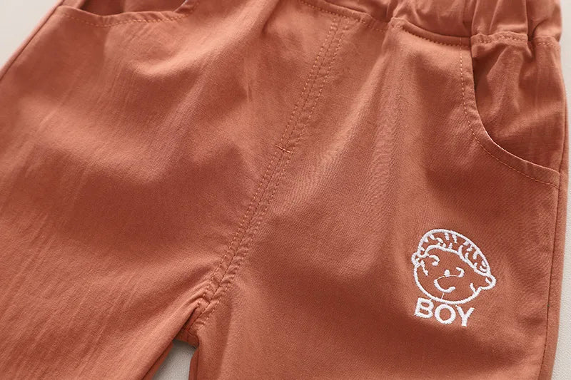 Pattern and styling on the boys casual summer t-shirt and shorts outfit - view 14