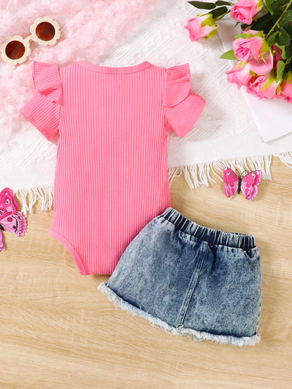 Back or secondary profile shot of the baby girls letter print romper and denim skirt set