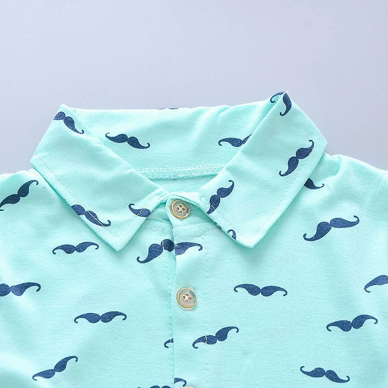 Side view of boys printed summer shirt & shorts suit