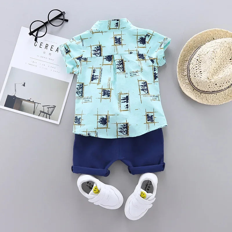 Back or secondary profile shot of the baby boys casual summer top and shorts set
