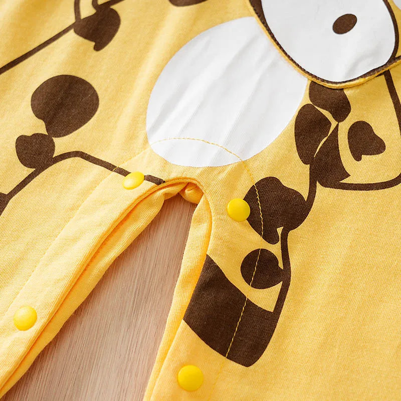 Close up highlighting the hem and stitching on the baby striped elephant and giraffe print romper