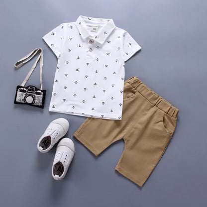 Style angle showing the boys summer t-shirt and shorts sportsuit - view 3