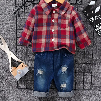 Fabric and texture detail of boys tartan polo shirt & denim trousers set