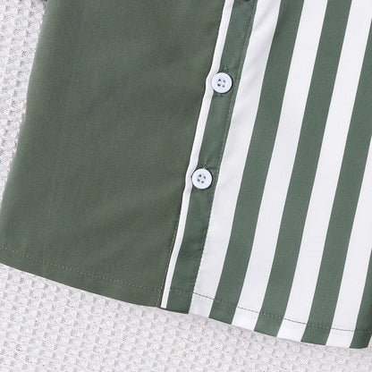 Close up highlighting the hem and stitching on the baby boys colour block short sleeve shirt and shorts set