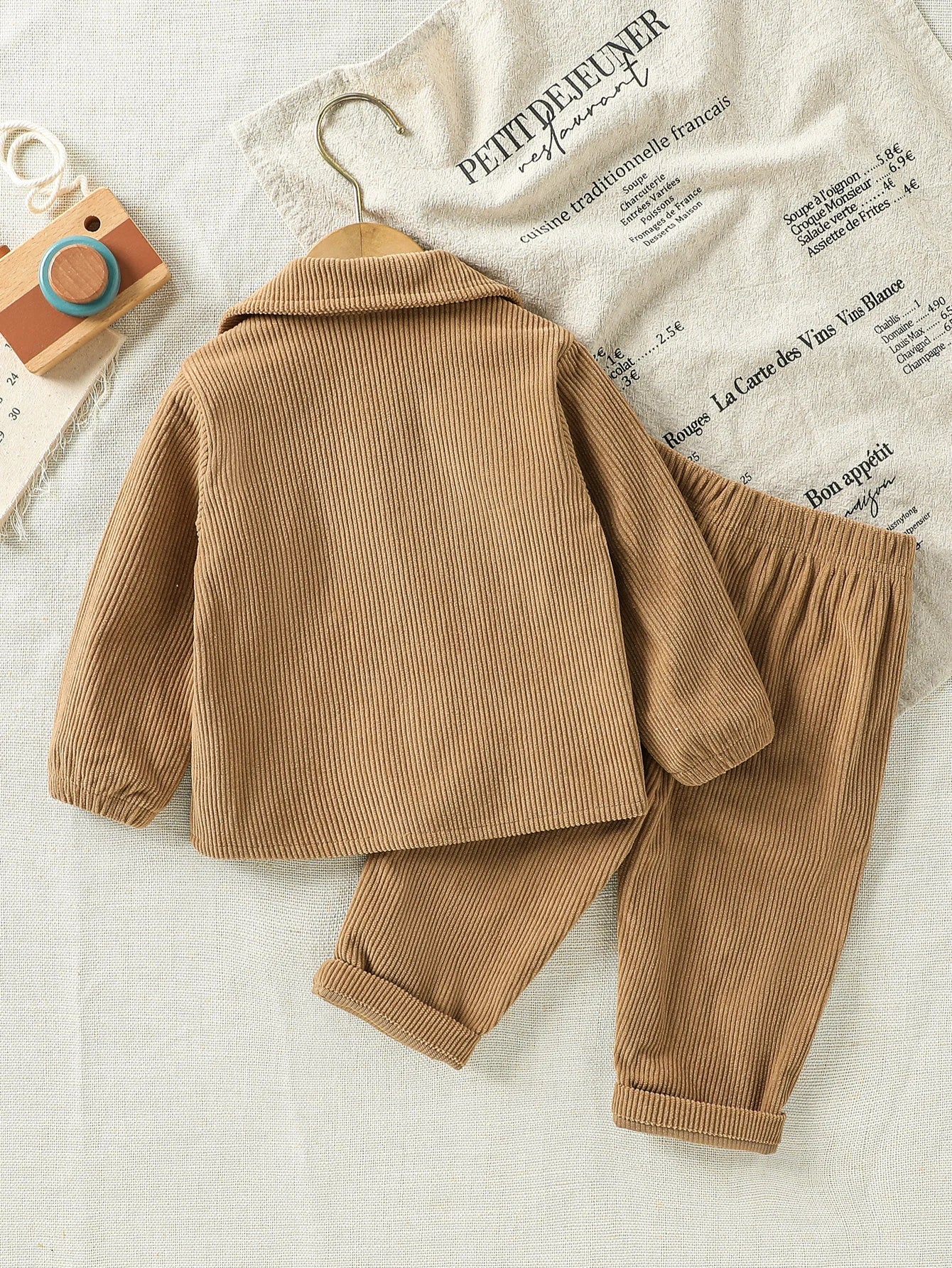 Back view of baby boys stylish jacket & pants outfit
