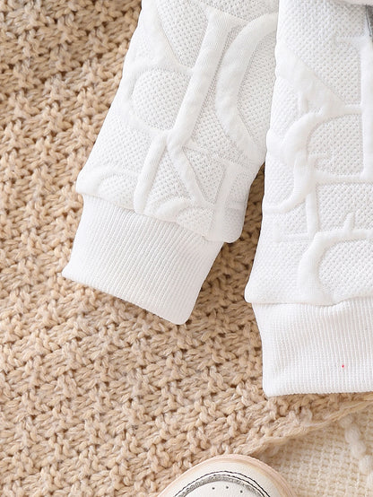 Side or lifestyle view of baby elephant appliqué quilted sweatshirt and joggers set