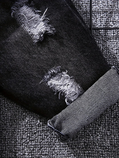 Close up detail of boys tartan polo shirt & denim trousers set