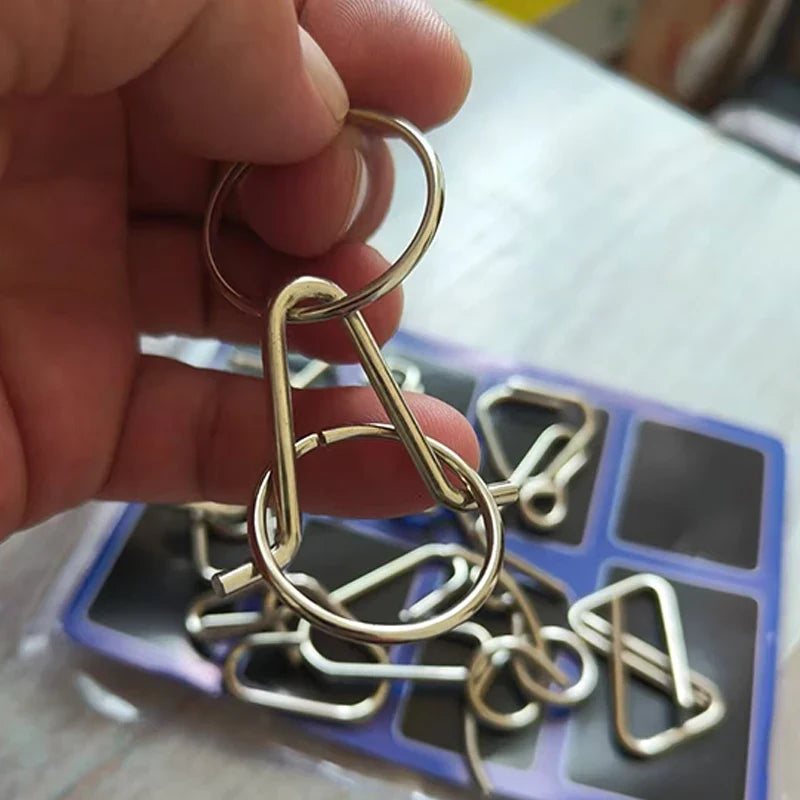 Metal Brain Teaser Wire Ring Puzzle Set – IQ Mind Challenge 3D Disentanglement Educational Toy 2026