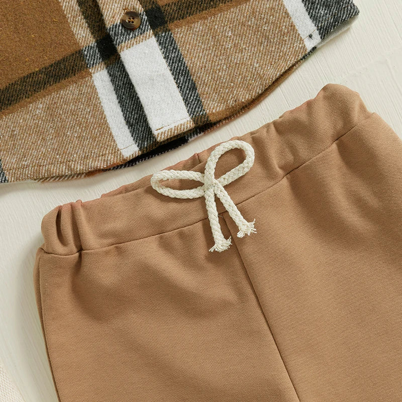 Side or lifestyle view of baby boys plaid shirt and elastic pants set
