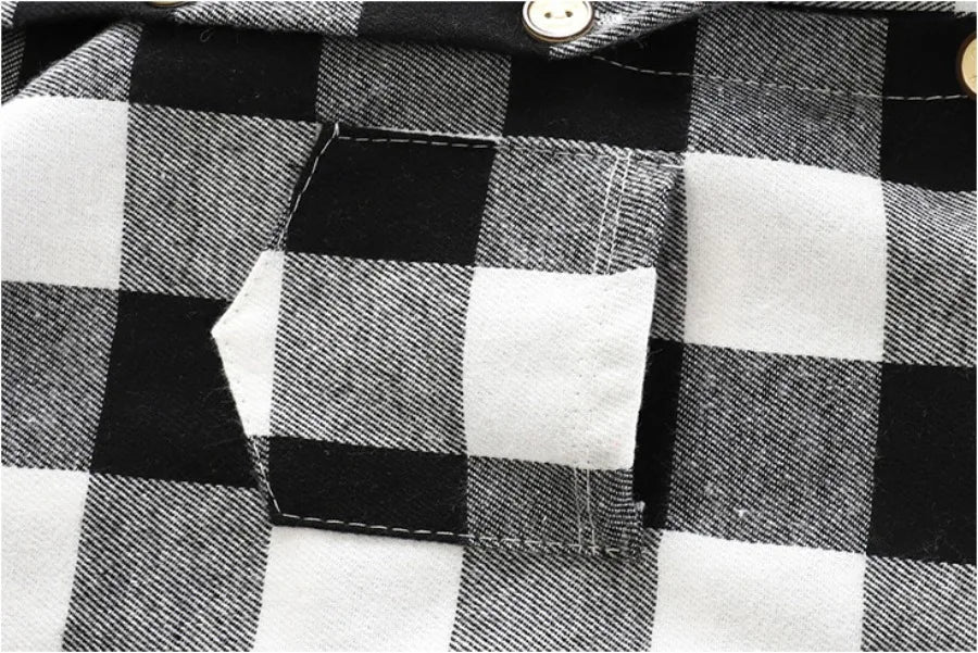 Fabric and texture detail of boys plaid long sleeve hooded jacket