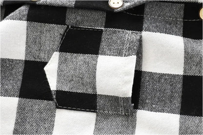 Fabric and texture detail of boys plaid long sleeve hooded jacket