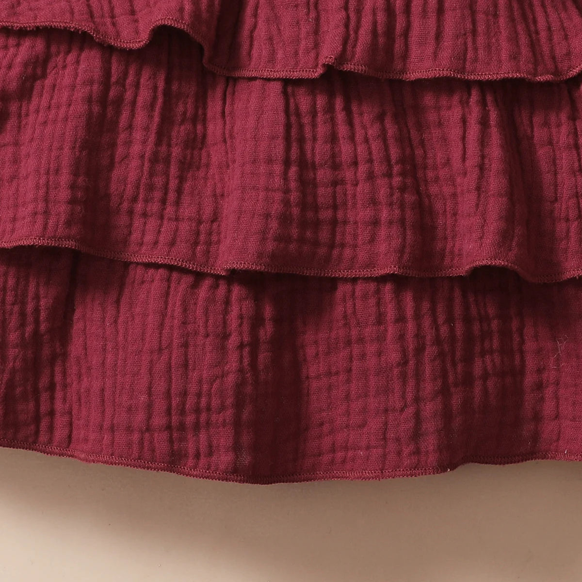 Fabric details of the baby girls red wine layered cupcake dress - view 6
