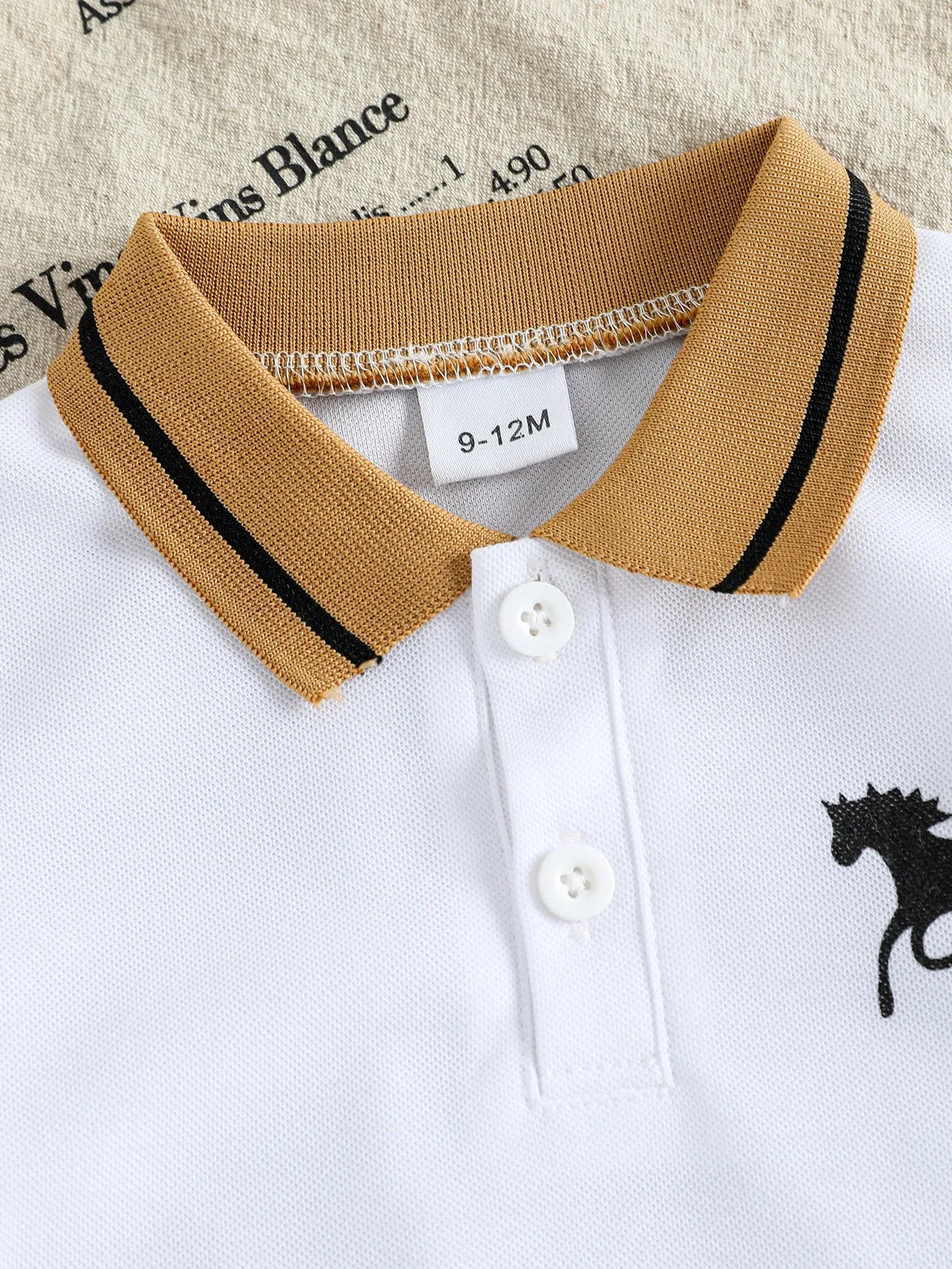 Styling option and alternate perspective of the baby boys cartoon t-shirt and shorts summer set