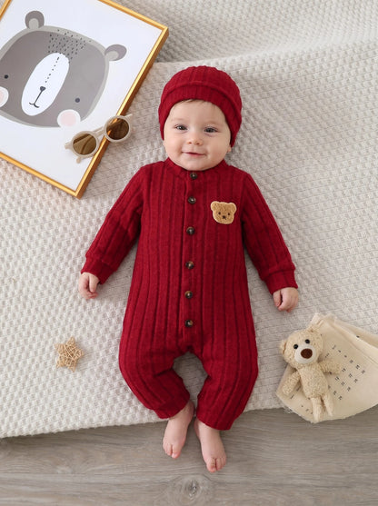 Side view of baby boys red bear badge onesie & hat set