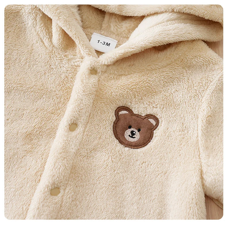 Fabric and texture detail of baby bear hooded winter flannel romper