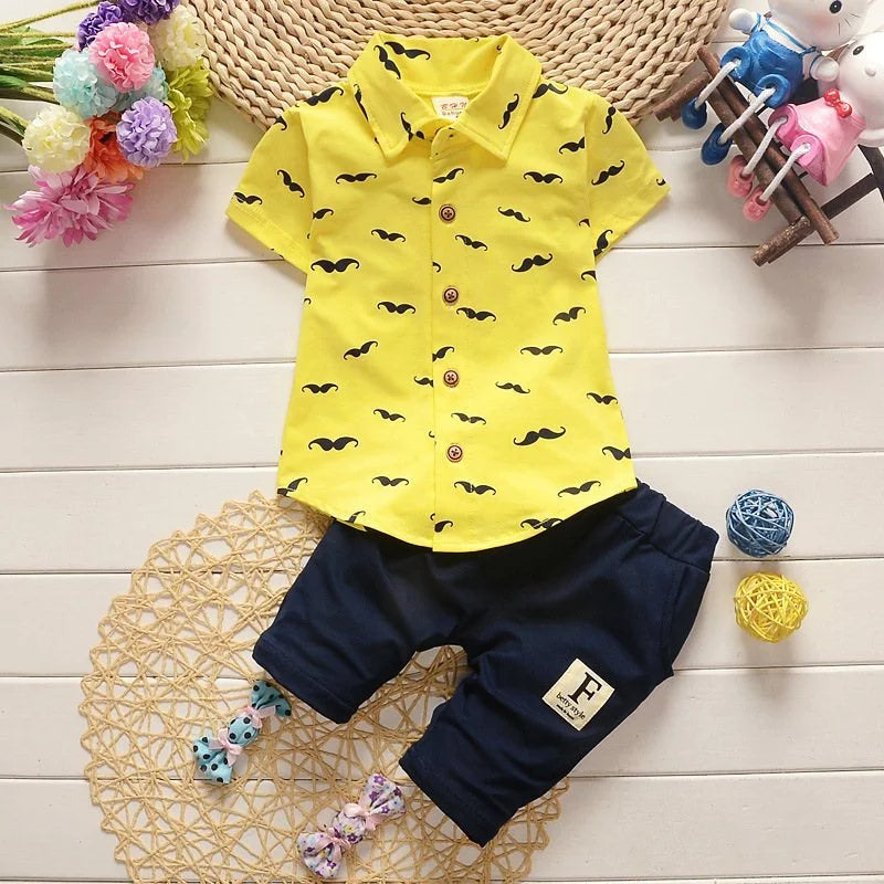 Fabric and texture detail of boys printed summer shirt & shorts suit