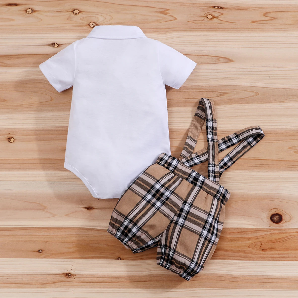 Side view of baby boys plaid bear bodysuit & trousers set