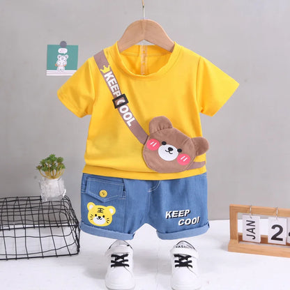 Styling option and alternate perspective of the boys cartoon bear t-shirt and shorts set