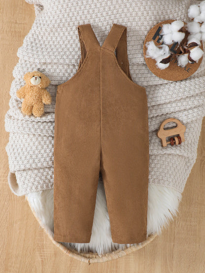 Adjustable waist detail on boys corduroy bear overalls
