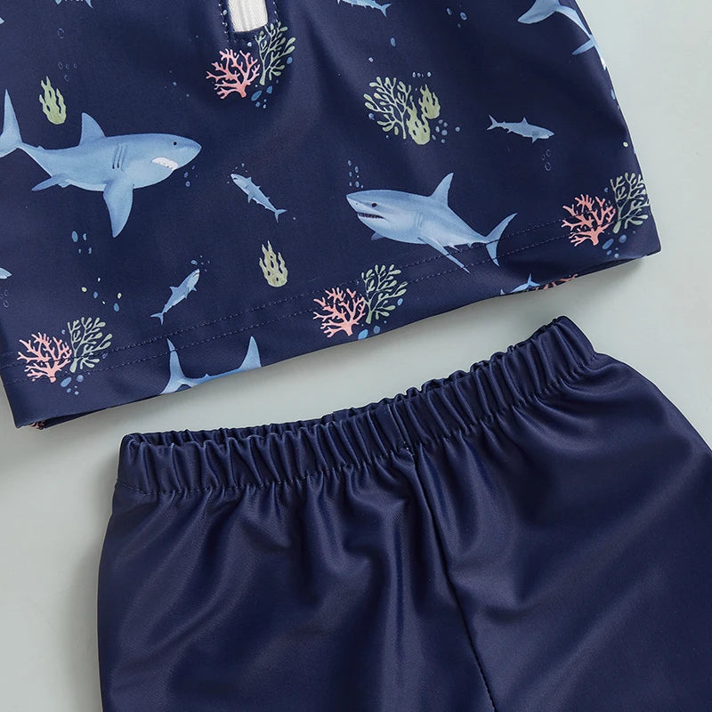 Detail shot of the Blue baby boys 3-piece zip rash guard swimwear set