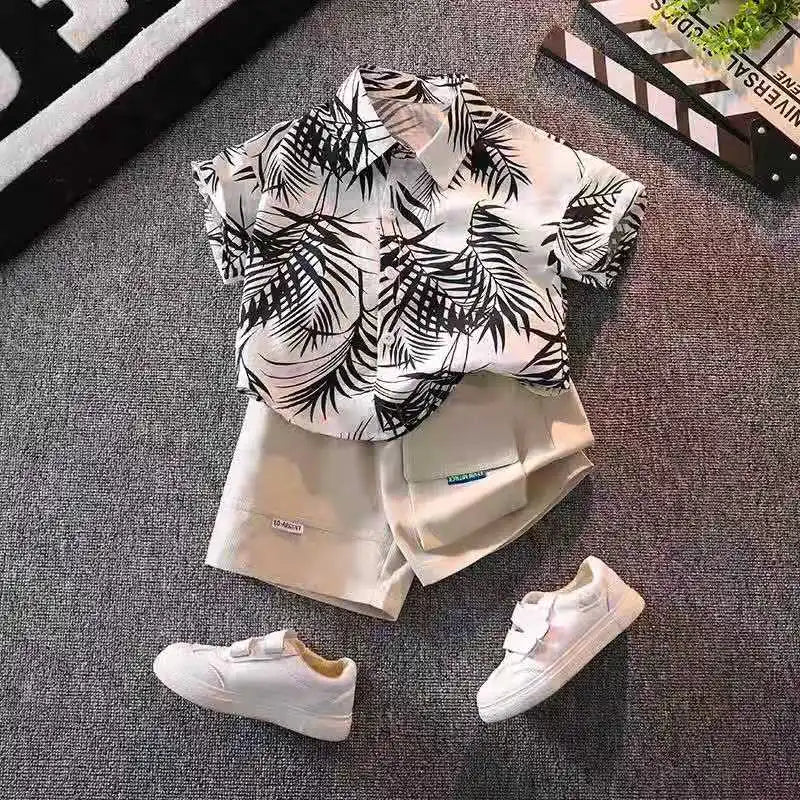 Close up look at the boys floral beach shirt and shorts set - view 10