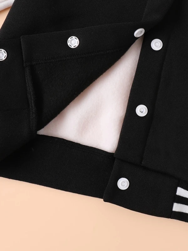 Fabric and texture detail of boys varsity letter jacket & sweatpants set