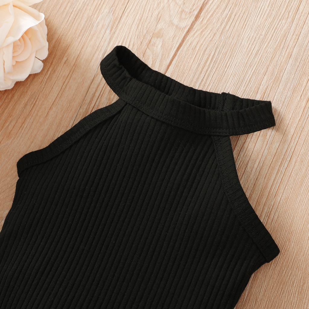 Baby girl wearing a ribbed halter top and matching short skirt