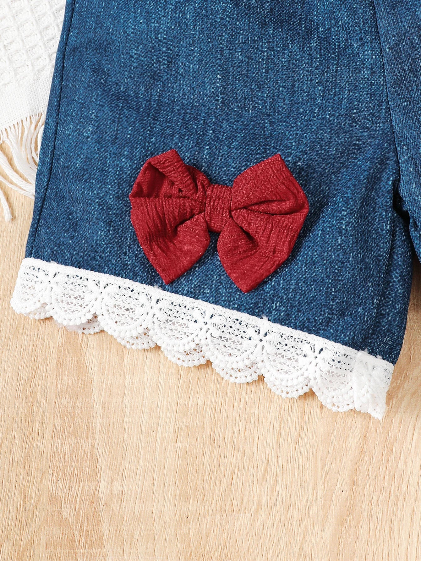 Side view of the baby girls ruffle top, shorts and bag set - view 8