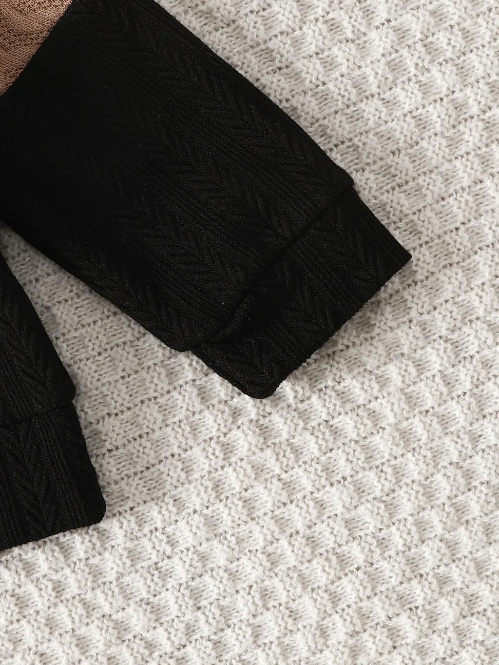 Fabric and texture detail of boys colour block long sleeve top & pants